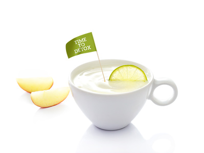 Detox diet, yoghurt in cup with lemon and flag text